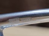 a close up of a metal handle on a bike