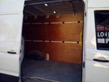 a white van that is open to show the inside of it