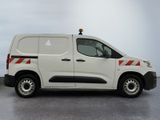 a white van with a red and white stripe on the side