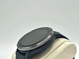 a smart watch that is sitting on top of a stand