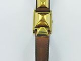 bracelet de montre en cuir marron orné de pyramides dorées