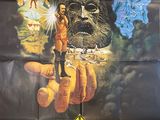 an old movie poster of a man standing on a giant hand