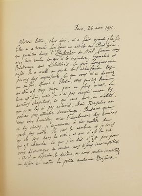 an old black and white photo of a handwritten letter in a book