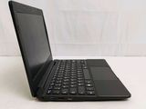 a black laptop computer sitting on a white table