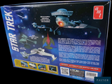 a box with a model of a star trek ship in it