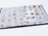 a wallet with a lot of coins inside of it