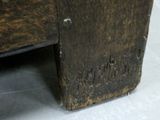 a close up of a piece of wood on the floor