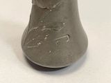 a gray vase with a picture of a cat on it