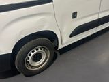 a white van that is parked in a garage
