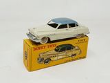 a small toy car sitting on top of a box