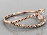 a close up of two rings with diamonds on them