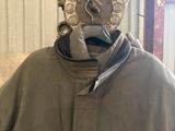 a man wearing a gas mask on his head