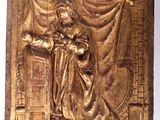 une image représentant une plaque en or sur laquelle figure Jésus