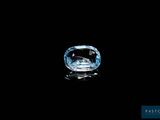 a blue diamond on a black background