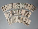 a lot of old postcards that are on the table