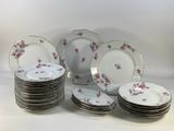 a lot of plates that are stacked on top of each other