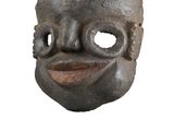 a close up of a mask on a white background