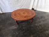 an image of a coffee table made of wood and wicker