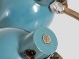 two blue lamps that are on top of each other