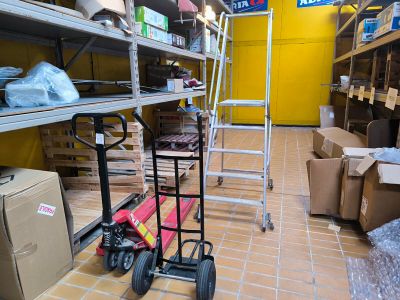 many boxes and boxes on the floor in a warehouse