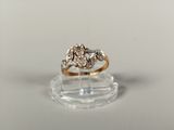 an image of a diamond ring on a clear surface