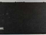 a black case sitting on top of a white table