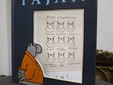 a picture of a book with a picture of a cat on it