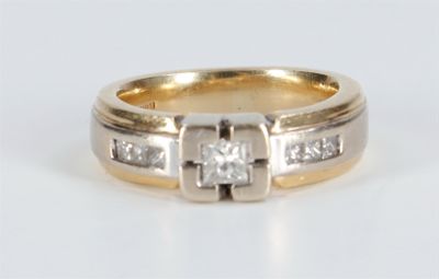 an image of a diamond ring on a white surface