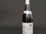 a bottle of wine that is sitting on a table