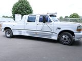 a white truck that is parked in the parking lot