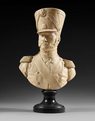 a carved bust of a man wearing a military uniform