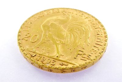 an image of a close up of a coin on a white surface