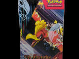 a box of pokemon trading cards on a black background