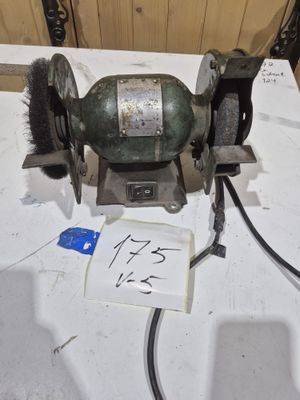a machine that is sitting on a table with a sign on it