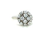 an image of a diamond cluster ring on a white background
