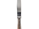 a knife that is sitting on top of a table
