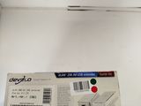 a white box with a red button on the side of it