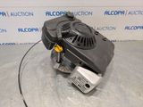 a close up of a small engine on a table
