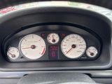 a close up of a dashboard of a car