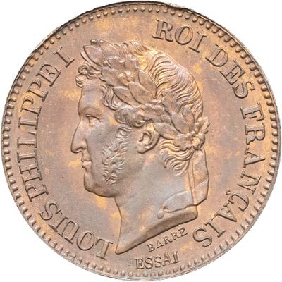 gros plan d'une pièce de monnaie sur laquelle figure une tête de femme