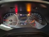 a close up of a car dashboard with a speedometer and gauges