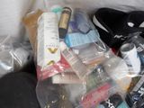many items in the plastic bag on the couch