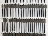 a lot of tools that are on a white surface