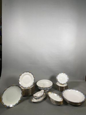 a lot of plates that are sitting on a table