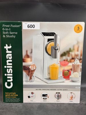 packaging of a blender sitting on top of a counter next to a box