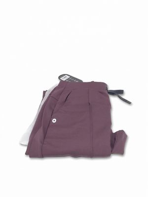 the back of a pair of purple pants on a white background