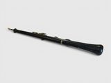 a close up of a black and gold flute on a white background