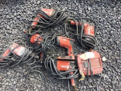 a bunch of tools that are laying on the ground