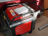 an image of a small portable generator in a garage