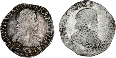 un gros plan d'une pièce d'argent sur laquelle figure l'effigie d'un homme